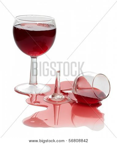 Broken glass and spilled red wine