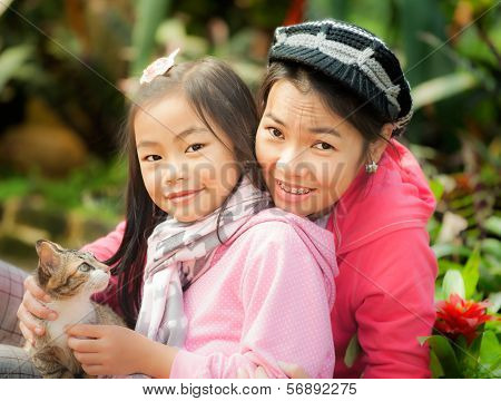 Young Mother And Her Cute Girl