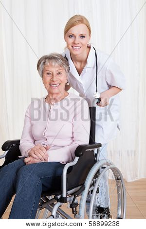 Caring Doctor Helping Handicapped Patient