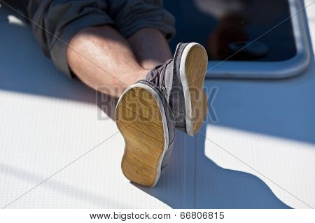 A Pair Of Hairy Man Legs In Pants And Topsiders
