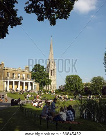 People on the grass in a local park
