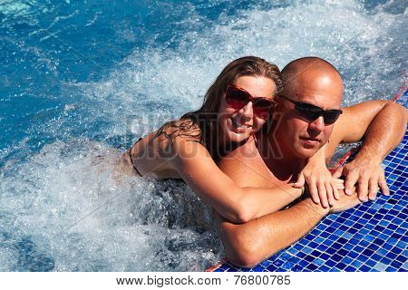 Loving Couple In Jacuzzi.