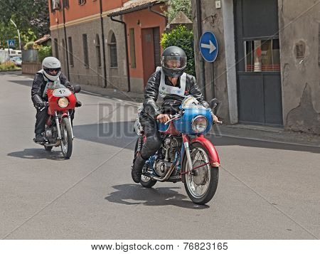 Bikers Riding A Vintage Ducati And Motobi