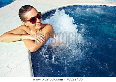 Beautiful girl relaxing in . Spa background