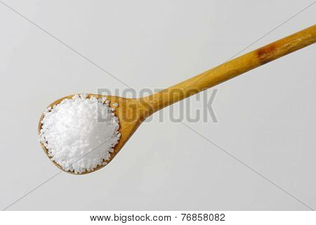 kitchen wooden spoon with portion of sea salt