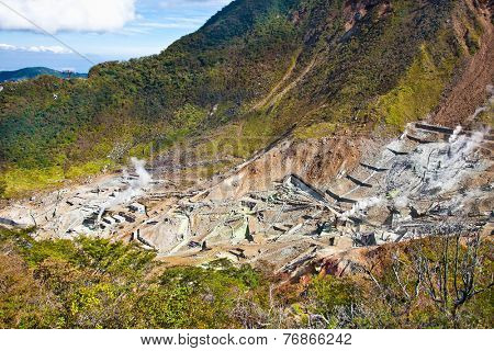 Owakudani valley, volcanic valley with active sulphur and hot springs, in Hakone, Kanagawa , Japan.