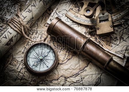 vintage still life with compass,sextant and old map. map of the 1570. Author: Abraham Ortelius (1527-1598) 