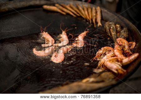 Sea food preparing on the fire