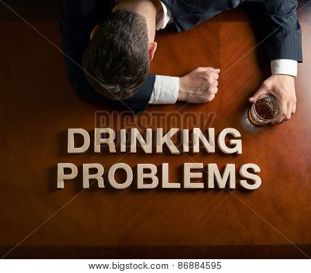Phrase Drinking Problems and devastated man composition
