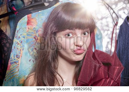 Portrait Of A Beautiful Teenage Girl And Her Wardrobe, With Bokeh