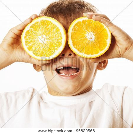 little cute boy with orange fruit isolated on white smiling