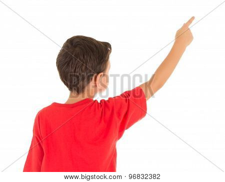 Back view of a young boy pointing his finger