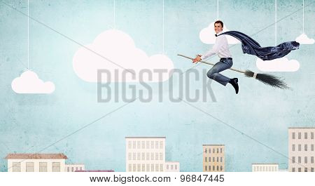 Man ride broom