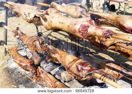Lambs On Spits Roasting