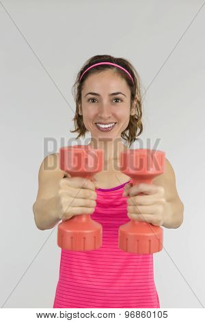 Strong Woman Lifting Dumbbells