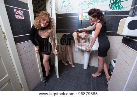 drunk girl in toilet bars. women in evening dresses in alcoholic intoxication