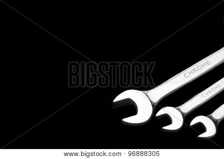 Three Fork Wrenches Isolated On Black Background