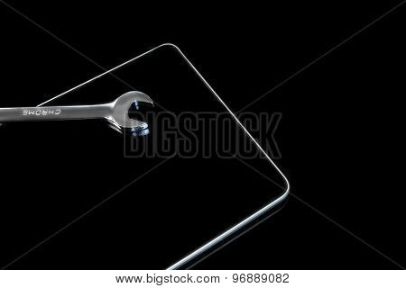 Chrome Fork Wrenches On The Tablet Display Black Isolated