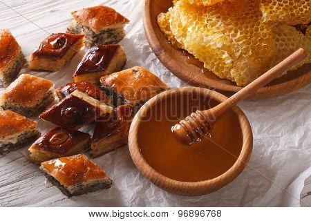 Oriental Sweets: Baklava With Poppy And Nuts And A Honeycomb.