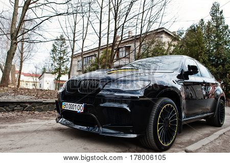 Kiev, Ukraine - March 22, 2017: Black Bmw X6 M Performance At Street.