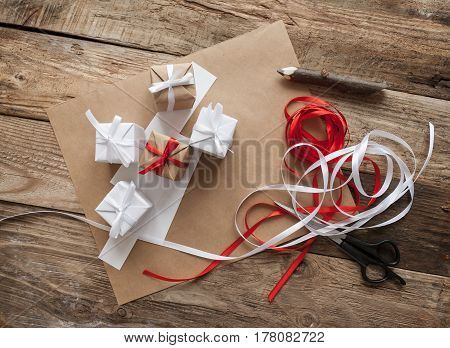 Background packaging gifts handmade red and white ribbon