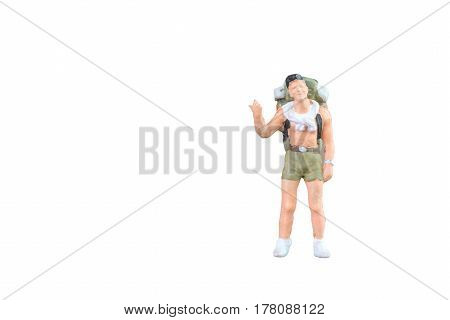 Close Up Of Miniature Backpacker And Tourist People Isolated With Clipping Paht On White Background.