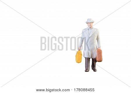 Close Up Of Miniature Businessman And Tourist People Isolated With Clipping Paht On White Background