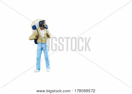 Close Up Of Miniature Backpacker And Tourist People Isolated With Clipping Paht On White Background.