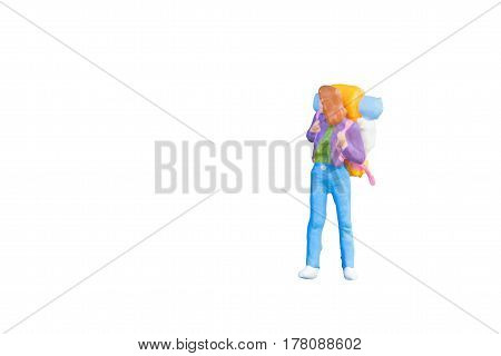 Close up of Miniature backpacker and tourist people isolated with clipping paht on white background.Elegant Design with copy space for placement your text mock up for travel concept