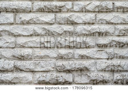 brick wall stone textured gray facade background