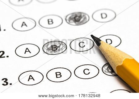 Test Score Sheet With Answers And Pencil . Closeup.