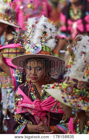 ORURO, BOLIVIA - FEBRUARY 25, 2017: Tinkus dancers in colourful costumes performing at the annual Oruro Carnival. The event is designated by UNESCO as being Intangible Cultural Heritage of Humanity.