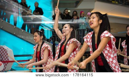 Moscow, Russia - March 25, 2017: Group Of Japanese Taiko Drummers Girls Perform In Kaleidoscope Shop