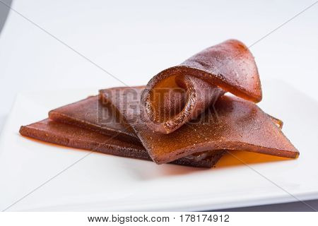 indian alphonso mango's dried jelly called mango papad or mango poli or slab or cake, traditional maharashtrian recipe
