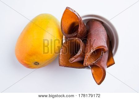 indian alphonso mango's dried jelly called mango papad or mango poli or slab or cake, traditional maharashtrian recipe