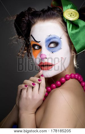 studio portrait of a young cute Clown