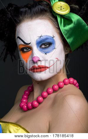 studio Portrait of the young cute sad mime
