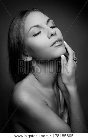 monochrome Portrait of beautiful woman on beige background