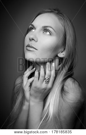 monochrome Portrait of beautiful woman on beige background