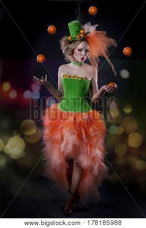 full-length portrait of a girl with fashion makeup on a black background
