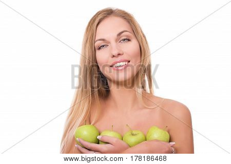 Young happy woman with apple isolated on white