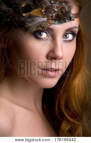 Closeup portrait of a redhead female model