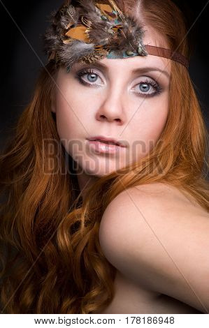 Closeup portrait of a redhead female model