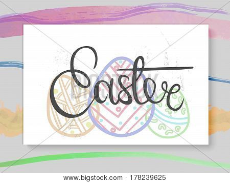 Vector postcard or banner with hand drawn lettering Easter and colorful eggs.