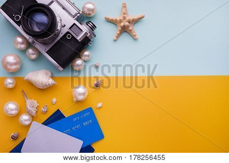 Travel Accessories On Blue And Yellow Background. Essential Vacation Items. Travel Concept, Top View