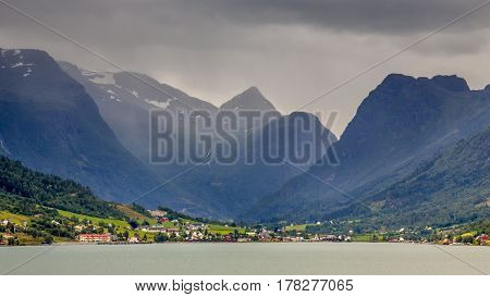 Landscape View Of Olden Village In Briksdalsbreen Glacial Valley