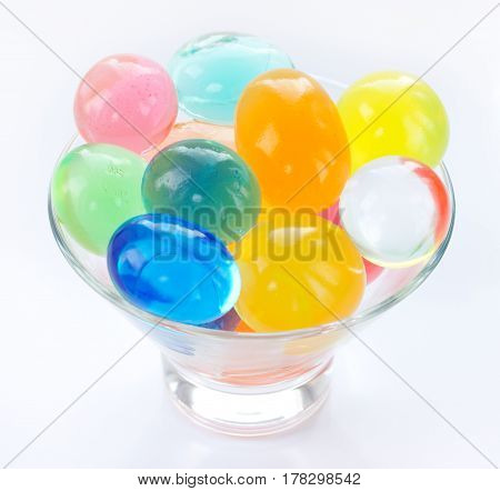 Color balls colored polymer gel hydrogel beads isolated on white background