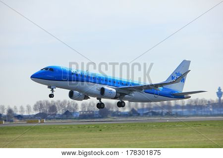 Amsterdam the Netherlands - March 25th 2017: PH-EXI KLM Cityhopper Embraer ERJ-175 takeoff from Polderbaan runway.