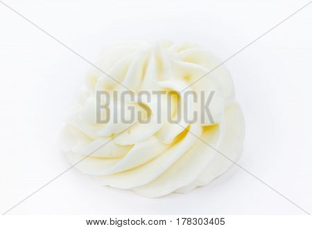 White cream swirl isolated on white background