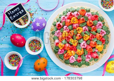 Beautiful flower cake buttercream tulip bouquet cake. Springtime cake or Easter cake decorated with edible tulip flowers